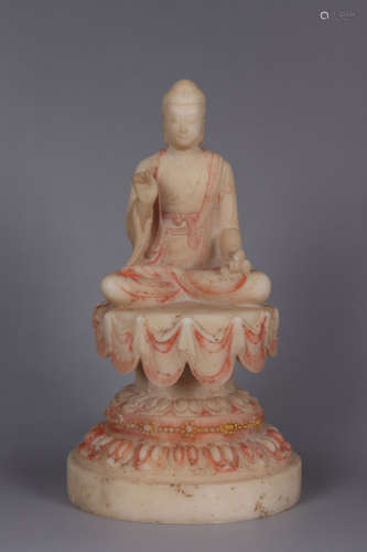 A MARBLE CARVING OF SEATED BUDDHA