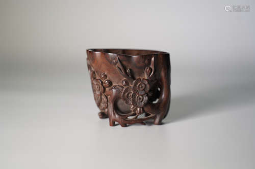 A CARVED SANDALWOOD PRUNUS CUP