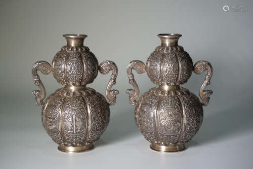 A PAIR OF SILVER DOUBLE GOURD-SHAPED VASES