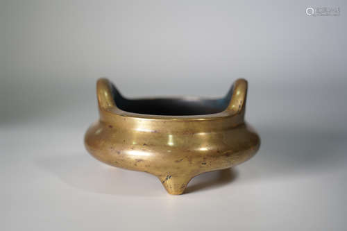 A GILT BRONZE TRIPOD UPWARD-EAR INCENSE BURNER