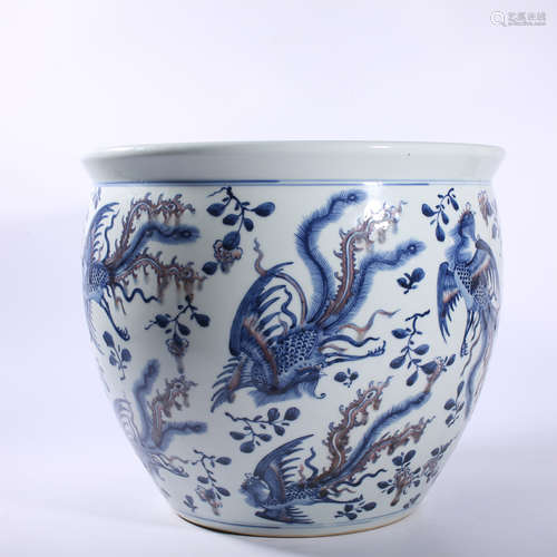 The big red phoenix pattern cylinder in the blue and white g...