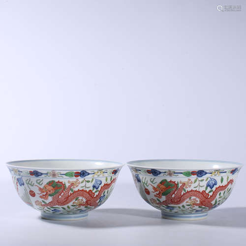 A pair of colorful dragon and Phoenix bowls in Qianlong of Q...