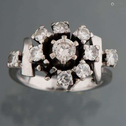 Bague en or blanc 18 carats avec diamant taille brillant.Poi...