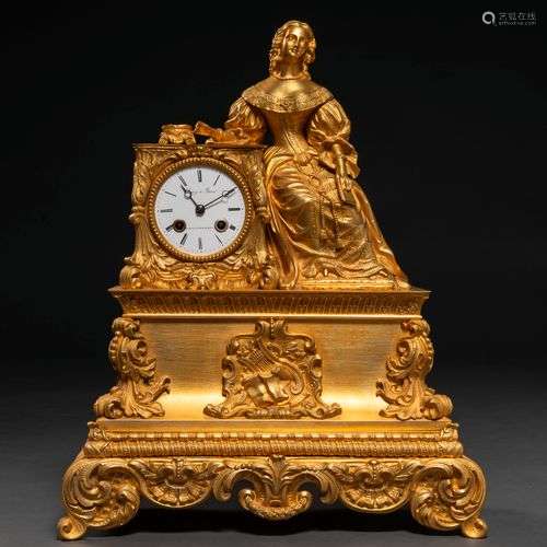 Pendule de table française de style Louis XV en bronze doré....