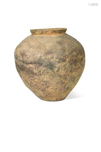 A Chinese grey-ware jar, perhaps Warring States,