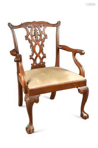 A George III style mahogany arm chair of generous proportion...