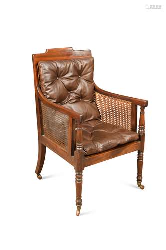 A Regency mahogany library bergere,