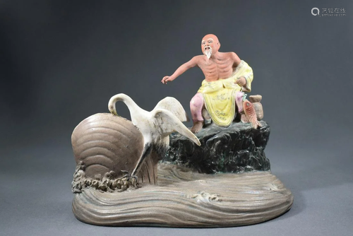 A Muli Colored Fish Man, Bird, Clam Porcelain Figure