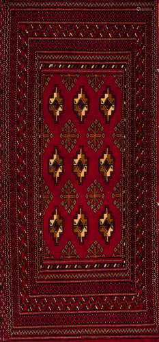 A Turkmen rug, IranWool and cotton Geometric pattern in bord...