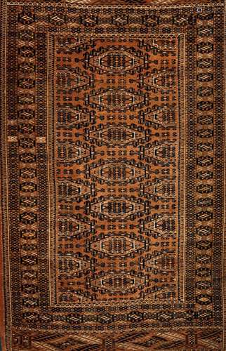 A Bukhara rug, IranWool and cotton Geometric pattern in brow...