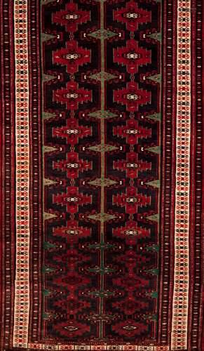 A Baluchi rug, IranWool and cotton Geometric pattern in bord...