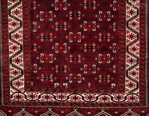 A Bukhara rug, IranWool and cotton Geometric pattern in bord...