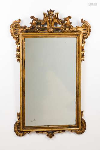 A D.José/D.Maria mirrorCarved and gilt wooden frame of volut...