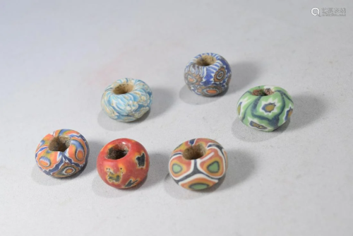 A Group of Colorful Glass Bead Set
