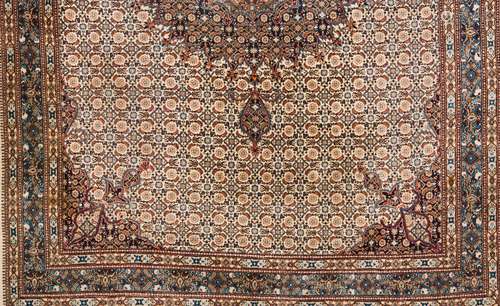 An oriental rug, IndiaWool and cotton Of Persian design in b...