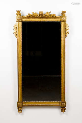 A louis XVI wall mirrorCarved and gilt wooden frame Beading,...