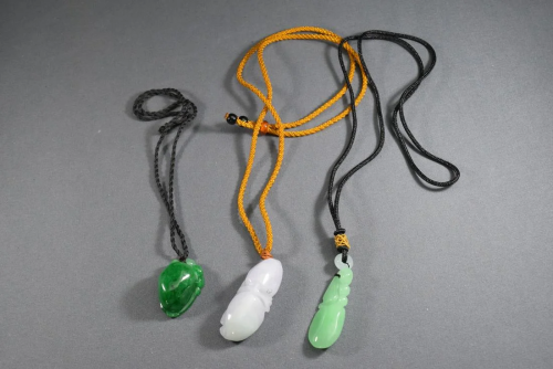 A Group Jadeite Pendant Necklace