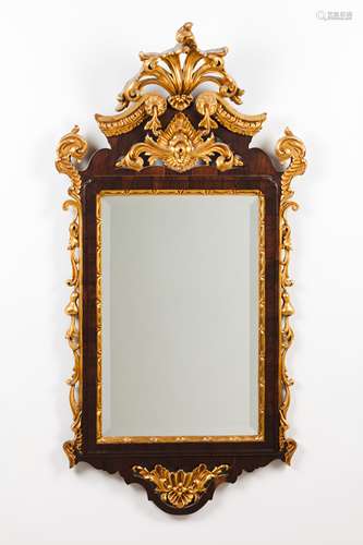 A D.José mirrorSolid and veneered rosewood of carved and gil...