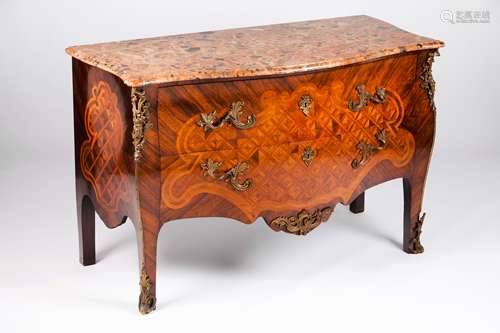 A Louis XV style commodeRosewood, jacaranda and satinwood Tw...