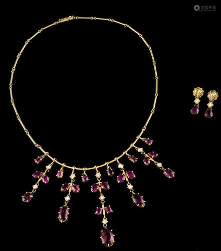 A necklace and a pair of earringsGold Cylindrical links and ...