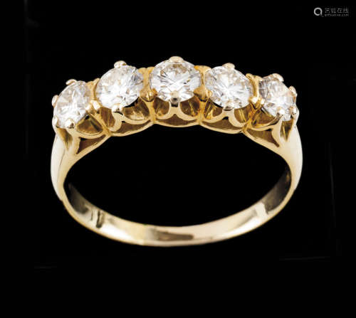 A memory ringGold Set with 5 brilliant cut diamonds totallin...