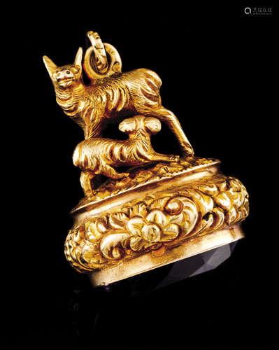 A wax stamp pendantPortuguese gold Goats on a raised foliage...