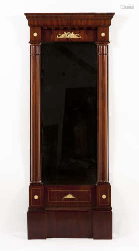 An Empire style mirrorMahogany With gilt bronze mounts Late ...
