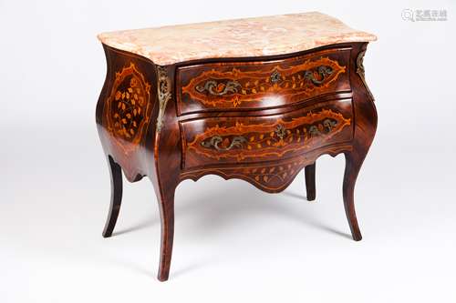 A Louis XV style commodeRosewood, jacaranda and satinwood ve...