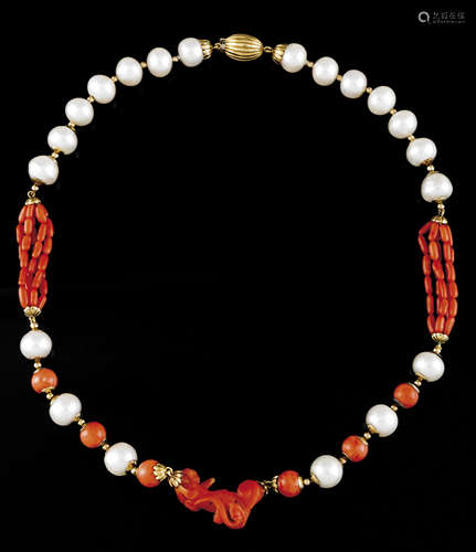 A necklaceSouthern Seas pearls alternating with gold and cor...