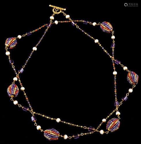 A necklaceGold Pearls, amethyst beads and faceted faux stone...