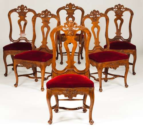 A set of six rocaille chairsWalnut Carved rails and aprons P...