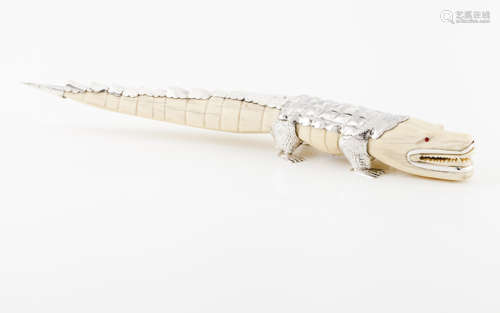 A Luiz Ferreira crocodileIvory sculpture with applied engrav...