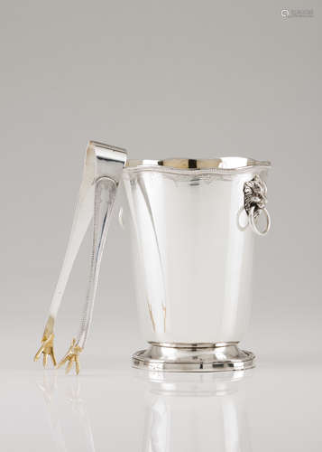 An ice bucket with tongs and gridPortuguese silver Plain bod...