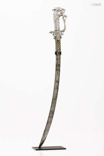 A Sinhalese sword - KastaneSilvered metal hilt of engraved a...