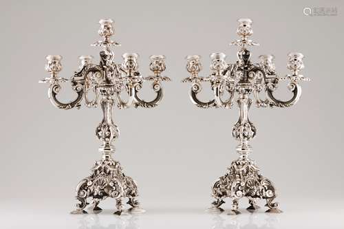 A pair of five branch candelabraPortuguese silver Profuse D....