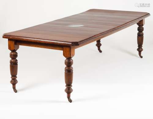 A Victorian dining tableMahogany Fluted legs and brass casto...