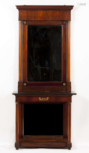 An Empire pier tableMahogany and bronze mounts Marble top Po...