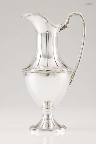 A water jugPortuguese silver Lip and foot of grooved decorat...