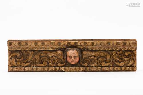 An altar fragmentCarved, gilt and polychrome wood Angel's he...