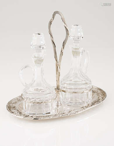 A cruet setPortuguese silver Oval stand of plain centre and ...