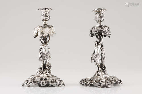 A pair of candlestandsFrench silver, 19th century Raised dec...