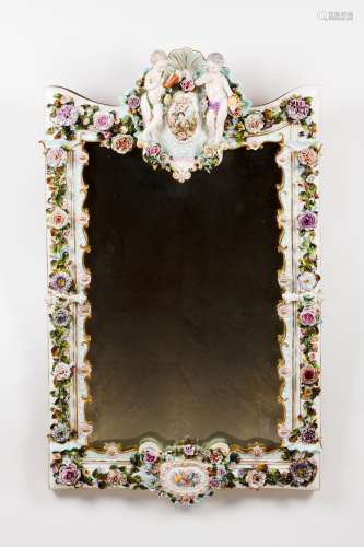 A wall mirrorEuropean Meissen style porcelain frame Raised a...