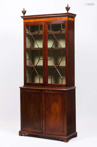 A bookcaseBrazilian mahogany, decorated with rosewood, kingw...