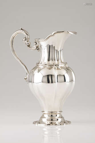 A water jugPortuguese silver Gadrooned body of scalloped mou...