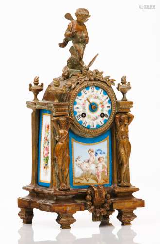A table clockGilt, relief and chiselled bronze Caryatids, bi...