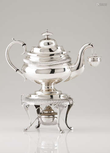 A teapot on stand, strainer and burnerSilver Plain oval body...