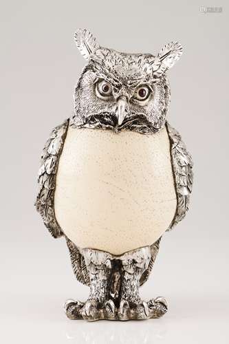 An owlSilver and ostrich egg Low relief, engraved and chisel...