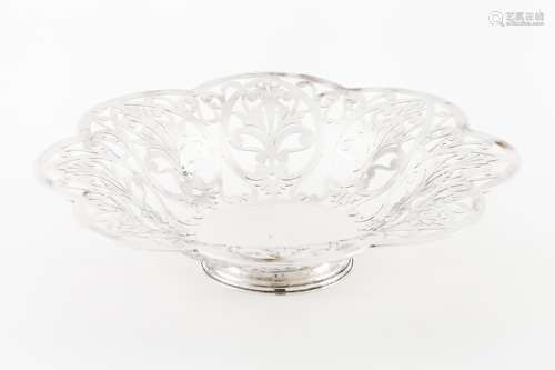 A footed fruit bowlPortuguese silver Plain centre of scallop...