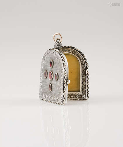 A reliquary and picture holderSilver with gold suspension ri...