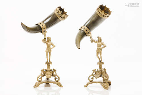 A pair of solitaire vasesBone cornucopias with metal shafts ...